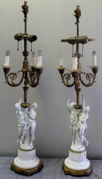 Pair of Fine Quality Sevres Parian Porcelain &: Bronze Mounted Figural Candlebra Lamps. Signed Lagnau. From a Rosedale, Queens, NY estate. Dimensions: 26.5" high. Condition: Good, tiny flower missing from finger and minute losses on wreaths.