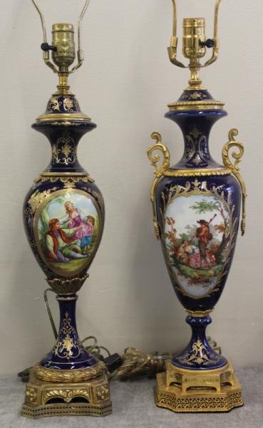 Two Sevres Style Bronze Mounted Lamps.: Each with bronze mounts and artist signed central scenes. Not disassembled for maker's marks. Sevres style but probably Dresden. From a Long Island, NY estate. Dimensions: 18.5" high including harps.