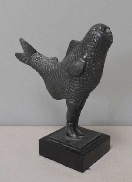 BUSTAMANTE, Sergio. Bronze of a Standing Fish.: Signed and numbered 22/100 on the base. Sergio Bustamante, Mexican, b. 1942. From an Eastchester, NY estate. Dimensions: 5.75" high x 2" wide x 6" deep. Condition: Good.