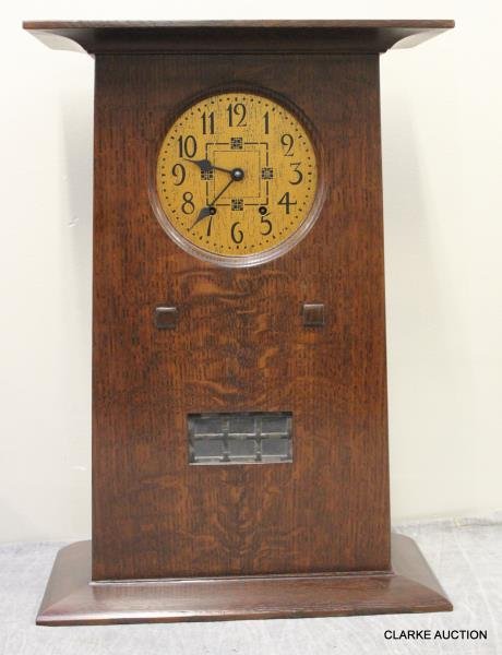 Stickley Audi Mission Style Oak Clock.: Signed on reverse. From a New Rochelle, NY home. Dimensions: 16" wide x 7" x 22" high. Condition: Good. All clocks sold as is.