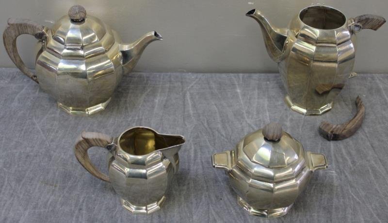 SILVER. Italian Continental Silver 4 Piece Tea Set: Includes a teapot, coffee pot, sugar and creamer. Marked 900, with additional maker's marks of "CC?"on bottom. Total approximate weight of all items, including all attached wooden components, is 45.65