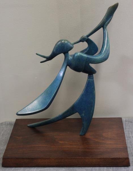 HAVLANI, Victor. Bronze Judaica Figure w/ Shofar.: With an edition number of 7/25. On a wood base. Beautiful blue patina. From a Long Island, NY location. Victor Halvani, Israeli, 1930 - . Dimensions: 16.875" high plus 1.375" base. Condition: