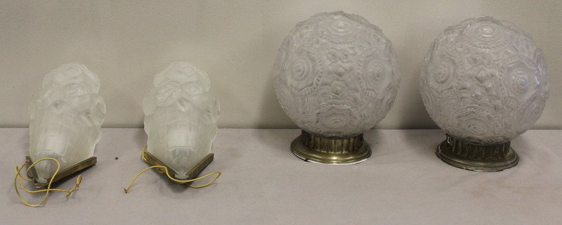 French Deco Lighting Lot.: Includes two flush mounted frosted glass geometric ball fixtures, and a pair of frosted glass slip shade sconces. Not apparently signed. From a Garrison, NY estate. Dimensions: ball fixtures - 9.5" di