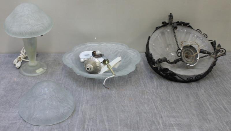 Vintage French Frosted Glass Lighting Lot.: Includes a hanging inverted dome in a wrought iron holder; a second inverted dome with probably associated parts; a table lamp and a matching dome shade to lamp. Apparently unsigned. From a Garrison, 