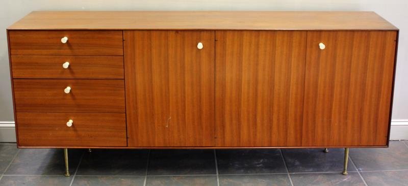 Midcentury Herman Miller Thin Edge Credenza.: Designed by George Nelson for Herman Miller. Paper / cardstock label. Accompanied by original can of Herman Miller "Gunstock" finish in original bag. According to consignor records, purchased in 1958.