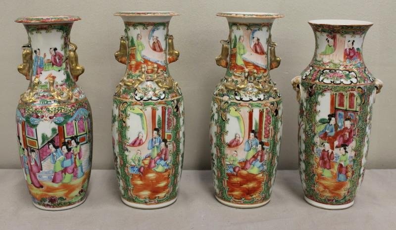 Rose Famille Lot.: Includes 4 similar cabinet vases - 3 with gilded foo dogs and lizards; the other with foo dog masks. From a Connecticut estate. Dimensions: approx. 2.875" diameter of base x 10.25" high. Condition: Go