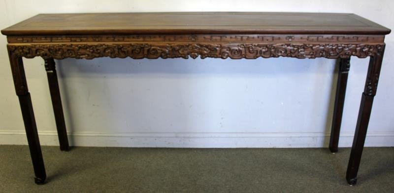 Antique Chinese Hardwood Altar Table.: Nicely carved and proportioned. From a Connecticut estate. Dimensions: 87.25" wide x 20.375" deep x 43" high. Condition: Shrinkage to inset top panel, shrinkage split to one edge, minor scuffs.