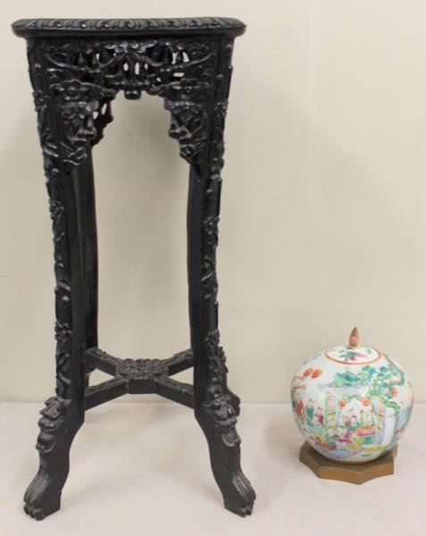 Chinese Marble Top Stand with a Ginger Jar.: From a Larchmont, NY home. Dimensions: Ginger jar - 7.125" h not including the finial on lid, stand - 13" w x 12.75" d x 29.25" h.