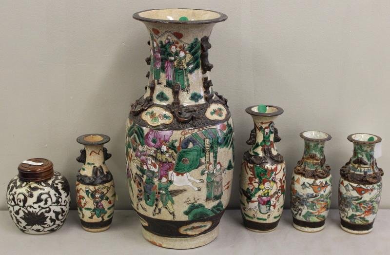 Chinese Porcelain Lot.: Includes a large enamel decorated signed vase with applied brown foo dogs and lizards, 4 similar cabinet vases including a pair, and a brown decorated tea caddy or ginger jar. Total of 6 pieces. From