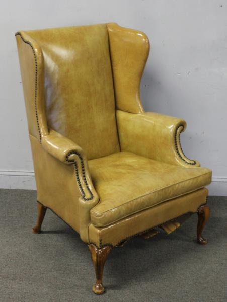 Queen Anne Style Leather Wing Chair.: From a Bedford Corners, NY estate. Dimensions: 31"w x 28"d x 43" high.