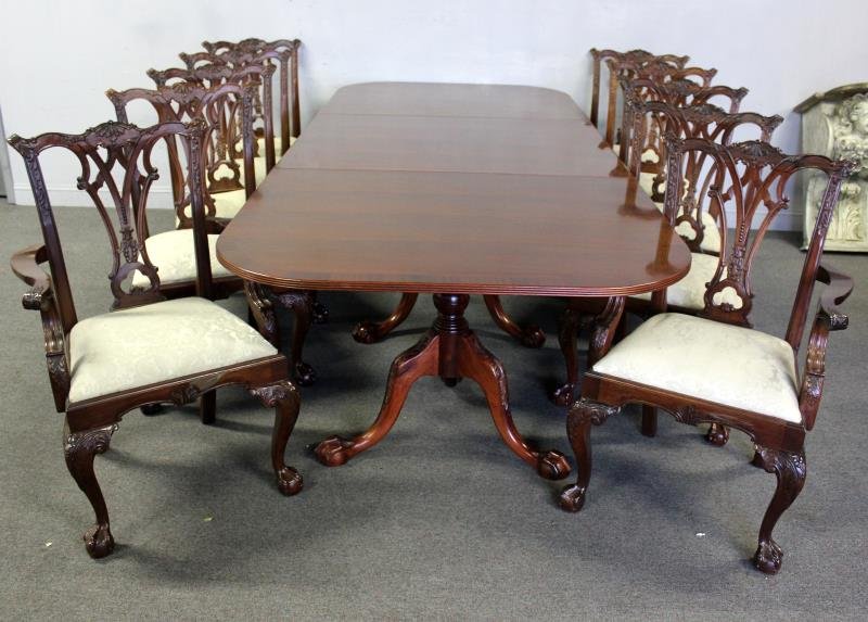 Modern Chippendale Style Dining Set.: Includes a banded triple pedestal with 2 leafs, and 10 matching chairs - 2 armchairs and 8 side chairs. From a New York City estate. Dimensions: table - 114.75" w x 48" d x 30.75" h; leaf width - 19."