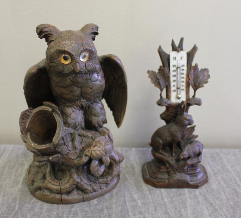 Two Black Forest Carved Pieces.: Including an owl pen holder and a rabbit form thermometer. From a Manhattan, NY estate. Condition: With splits and some wear. Dimensions: owl - base: 5" w x 4.5" d, 8.5" high overall.