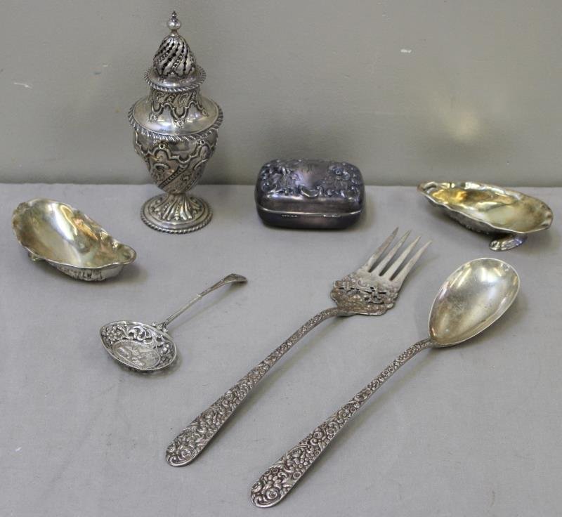 STERLING. Miscellaneous Flatware and Hollowware.: Includes a Sheffield sugar caster with a date letter of 1902, a Dutch repousse spoon, a repousse floral box with gilded interior, large floral serving spoon and fork, and 2 Gorham shell form bowls. To
