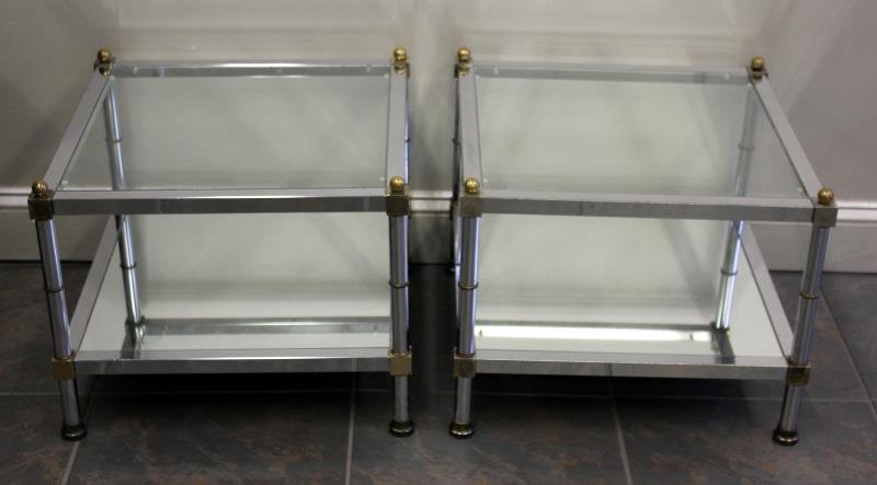 Pair of Midcentury Chrome and Brass End Tables.: Two tiered chrome frame end table with brass finials and mirrored lower tier. From a Manhattan, NY apartment. Dimensions: 20" w x 20" d x 16" h. Condition: Good with minor wear on finials.