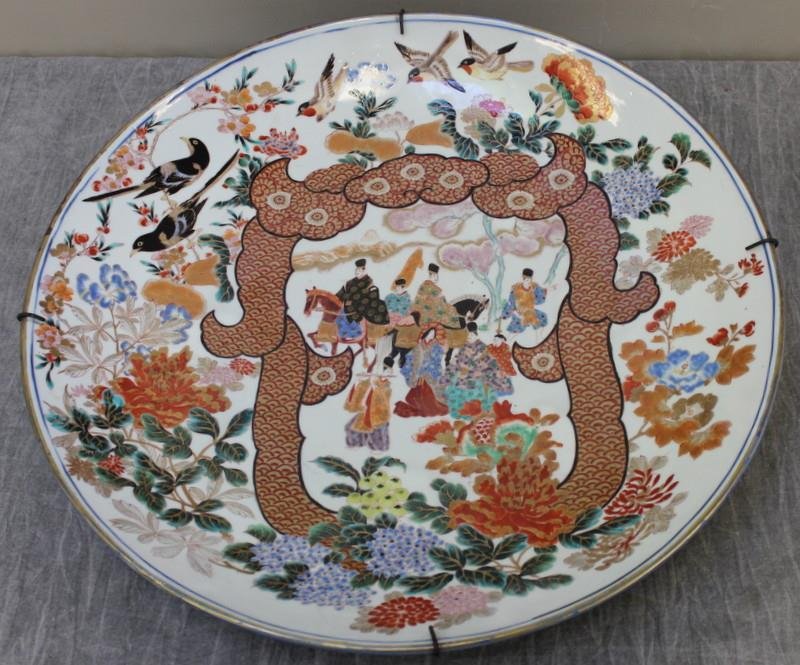 Large Signed Asian Charger.: With central figures on horseback. From a Connecticut estate. Dimensions: 25" diameter x 4" high. Condition: Good, with some gilt wear.
