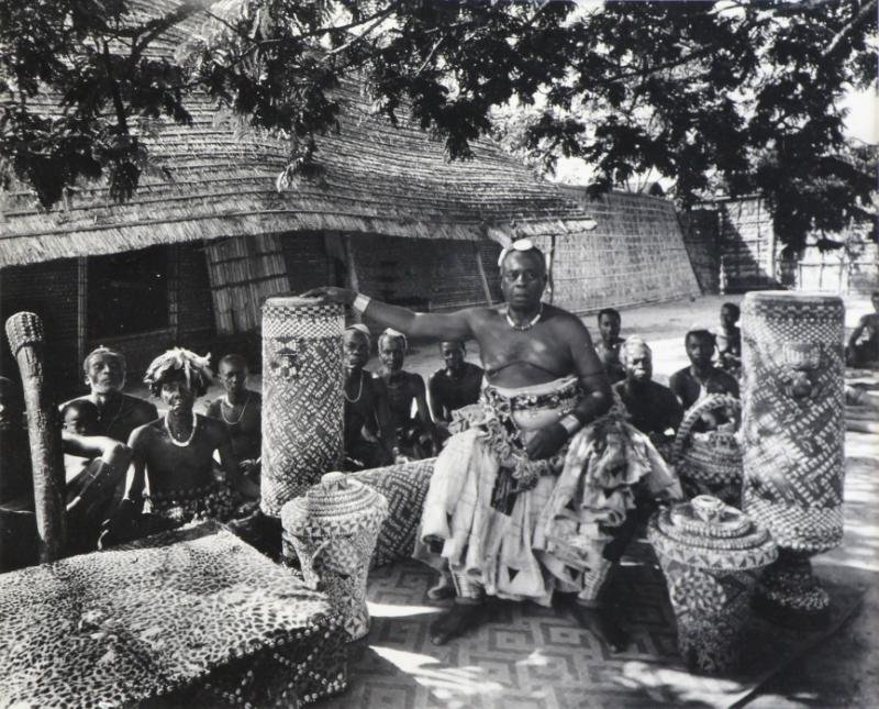 NEWMAN, Arnold. Gelatin Silver Print. "King of the: Bakubas, Congo, 1958." A rare image. Titled and dated lower left on the mat and signed '(c) Arnold Newman' lower right on the mat. Arnold Newman, American, 1918-2006. From the East 66th St NYC Estate