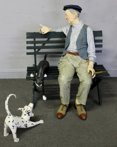 Realistic Papier Mache Sculpture of a Man on Bench: on Bench. Signed K. Ritter and dated 1990, Kay Ritter, American, 20th century. Together with one sculpture of a cat and one of a dog by a separate artist. Cat and dog signed Schliff. From a Manhattan,