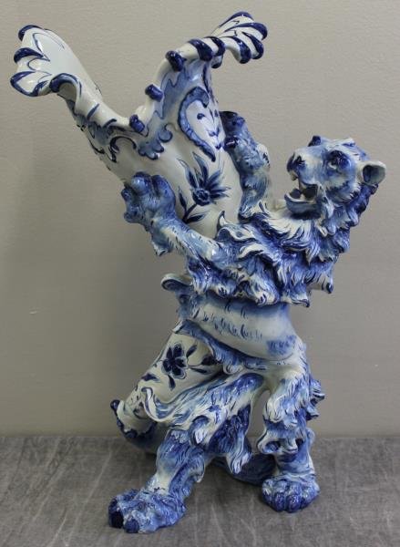 Blue and White Faience Cornucopia Vase with Lion.: From a Sloatsburg, NY location. Dimensions: 11.5" w x 6.75" d x 16" h. Condition: Chips around base.