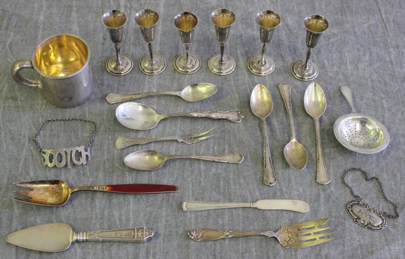 STERLING. Miscellaneous Hollowware and Flatware.: Includes 6 Whiting pedestal cups - with monogram; a Gorham child's cup - with monogram; 4 .800 silver teaspoons; a silver tea strainer; "Scotch" & "Rye" liquor tags; a Norwegian sterling and enamel 3-