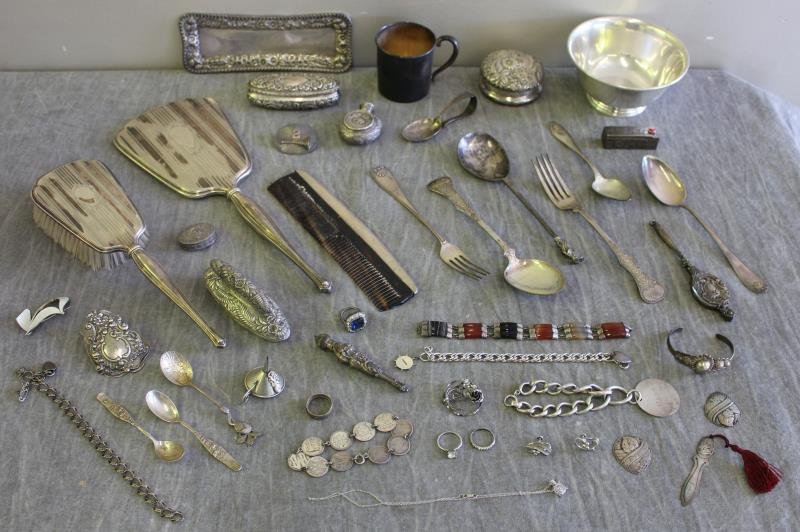 STERLING. Large Miscellaneous Silver Grouping.: Includes a sterling pedestal bowl; a child's cup - engraved Doris; a matched hand mirror, brush and comb; a child's spoon; 3 demitasse spoons; teaspoon; an English vanity box; a Kirk & Son repousse va