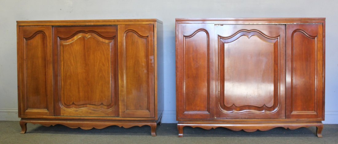 Pair of John Stuart Slide Front Cabinets.: Fitted interiors. John Stuart label to reverse. From a Larchmont, NY estate. Dimensions: 52" W X 21.5" D X 41.5" H.