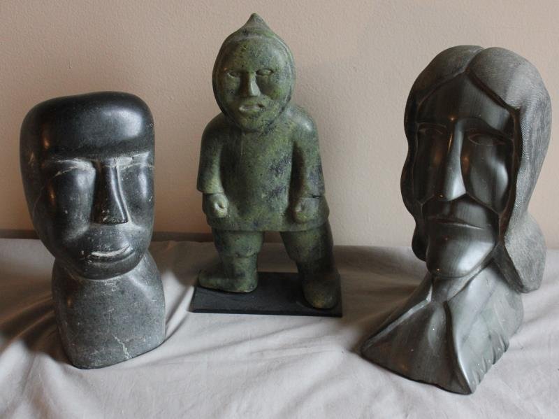 3 Piece Inuit Lot.: Includes a standing figure - 9" w x 15" h, a single bust - 8" w x 14" h, and a bust of a woman - 10" w x 15" h. From a West 57th St. NYC estate.