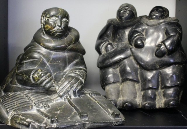2 Piece Inuit Carving Lot Depicting Trades.: Includes a grouping and a woman weaving - 17" w x 10" h. From a West 57th St. NYC estate.** TAKE NOTE LOT HAS BEEN REVISED