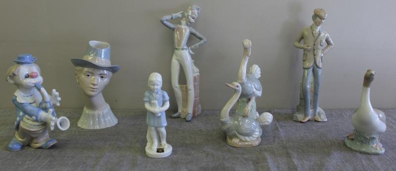 Lladro Lot.: Includes an ostrich, goose, clown with a saxophone, several figures, and a small non-Lladro figure of a girl. From a Greenwich, CT home. Dimensions: man with fez - 12" high; ostrich - 9.25" high. Cond