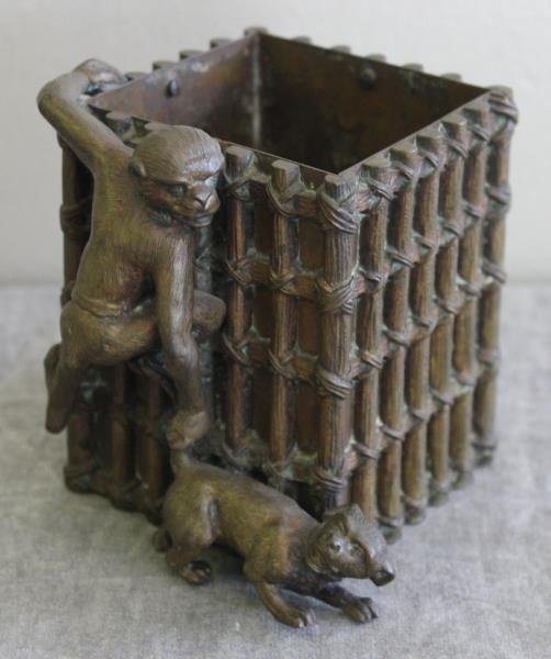 Antique Bronze Bamboo Form Planter.: With monkey and dog motif. Please note the unusual crescent and arrow mark. From a Manhattan, NY estate. Dimensions: 3" w x 3" d x 3.75" h - excluding figures. Condition: Good.