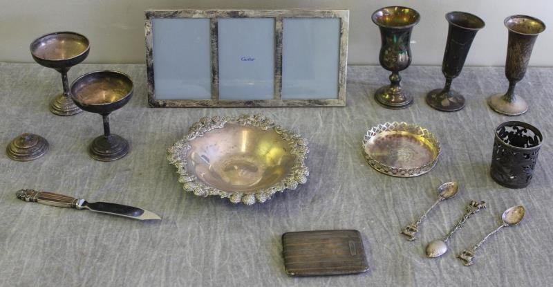 STERLING. Miscellaneous Hollow Ware Grouping.: Includes a Tiffany & Co. floral bowl; an Elgin 14kt over sterling monogrammed cigarette case; a Georg Jensen acorn pattern knife; a Tiffany & Co. wine coaster; 3 kiddush cups; 3 .800 silver souvenir s
