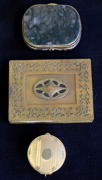 GOLD. Decorative Box Grouping.: Includes a small 14kt yellow gold round pill box; a rectangular hardstone box with rounded edges; and a French compact with central dragon? French compact possibly silver? Total approximate weight of 