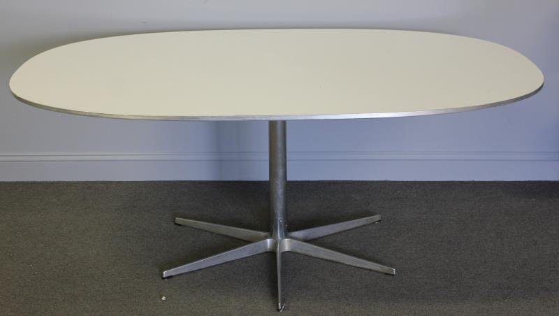 Midcentury Fritz Hansen Meeting Table.: With aluminum single pedestal and star base. Aluminum trim to highly coated laminate top. Designed by Piet Hein for Fritz Hansen. Marked on base under pedestal with partial stamps for Piet Hein, Fritz