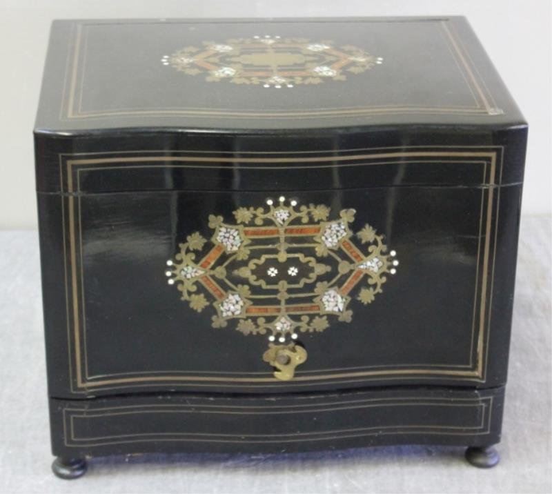19th Century French Inlaid Ebony Tantalus.: With brass, mother of pearl, and other inlay. Beautiful original gilded interior stemware and decanters. Interior removable. From a Hartsdale, NY estate.