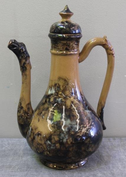 Rookwood Turkish or Moorish Coffee Pot.: Possibly a chocolate pot. Allover decoration with a central moon lit owl on a branch. Spout as a stylized griffin? Artist signed with initials. From a Croton, NY home. Dimensions: 7.25" width from han