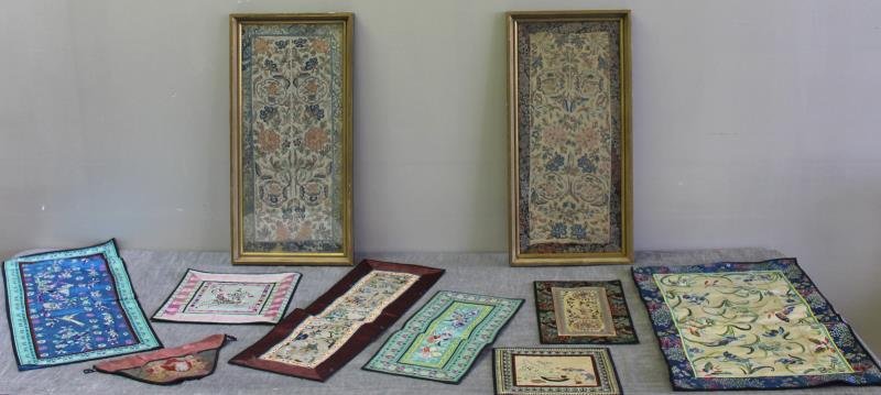Asian Textile Lot.: Includes a pair of framed Kesi panels, and eight assorted table runners or mats. Mostly silk. From an Ossining, NY estate. Dimensions: framed Kesi panels - 11.125" w x 23" high overall. Condition: Gen