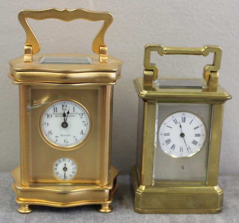 Miniature Carriage Clock Lot.: Includes a signed German double dial gilded model - signed Gebruder Eppner Hufu ?Rmacher?, Berlin. With a brass carriage clock. From a Manhattan, NY estate. Dimensions: Berlin clock - 2.5" w x 2.25" d