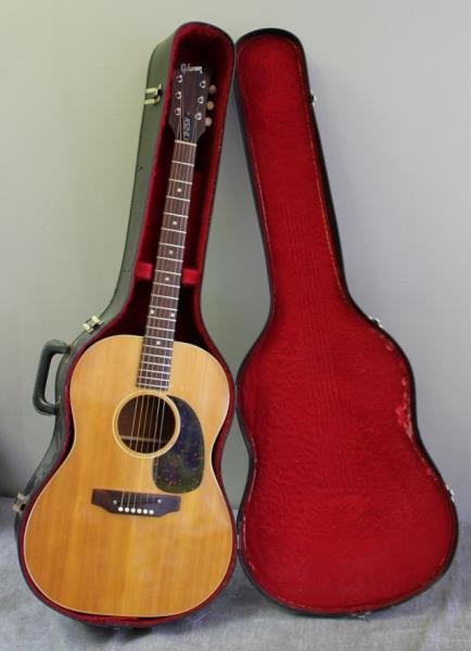 Gibson B25-N Deluxe Model Acoustic Guitar.: With original manual, factory order tag dated Feb. 1971, truss rod key, and original case. From a West 93rd Street, NYC estate. Condition: Good.Looks to have old professional repair