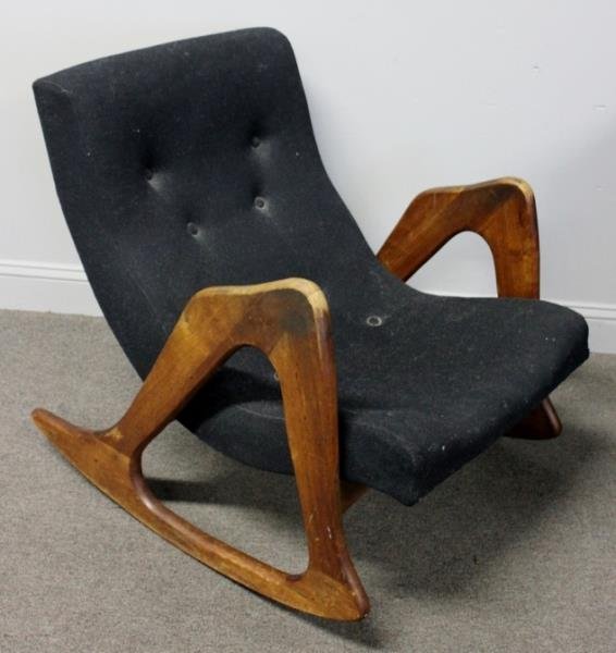Midcentury Adrian Pearsall for Craft Associates: Rocking Chair. Craft Associates label to underside. From a Mamaroneck, NY estate. Dimensions: 26.25" w x 33" d x 30" h. Condition: Foam hardening throughout. Unnoticeable put present seam? to one side