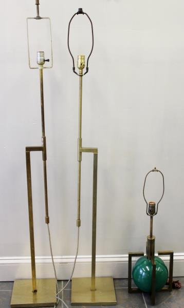 Midcentury Lighting Lot Including Pair of Laurel: Adjustable Floor Lamps. Together with a green painted globe in brass cage geometric table lamp. From a Manhattan, NY estate. Dimensions: Pair - 56" h adjustable. Condition: Need cleaning.