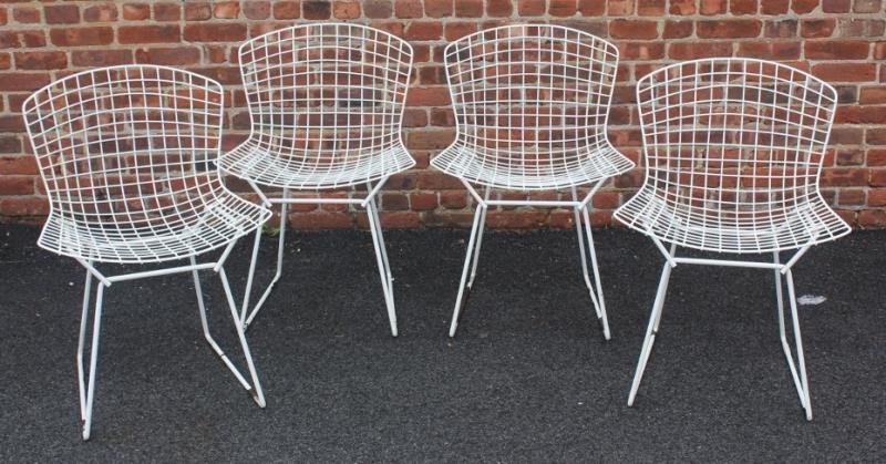 Set of 4 Harry Bertoia for Knoll Dining Chairs.: From a Purchase, NY estate. Dimensions: 21" w x 21" d x 30.5" h. Condition: Losses to lower legs on some. Wear appropriate to age.