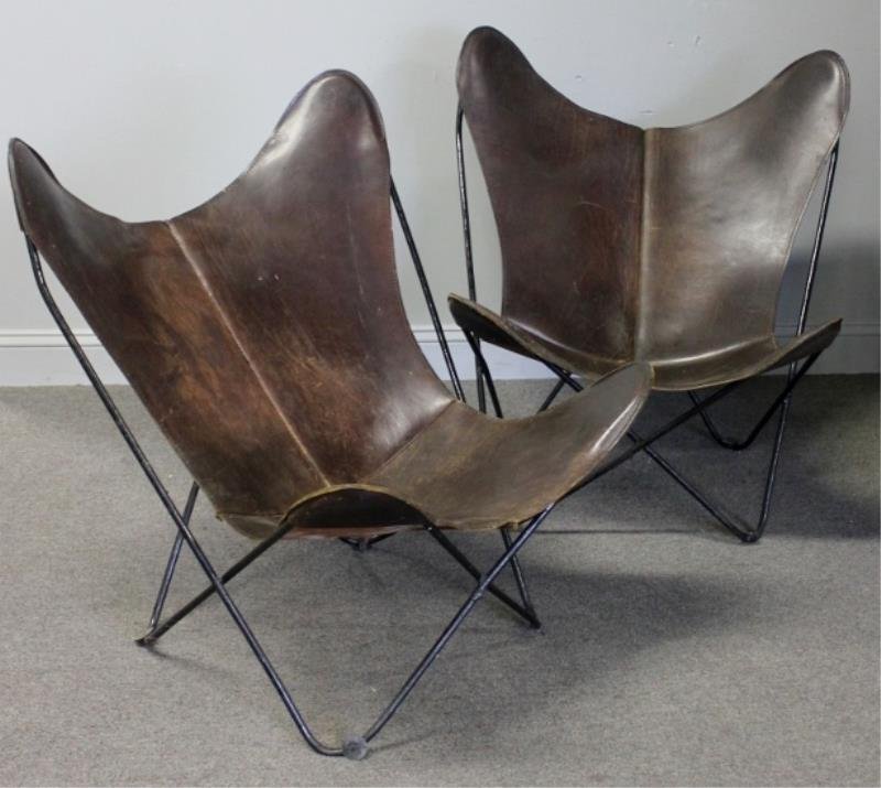 Midcentury Pair of Leather BKF / Butterfly Chairs.: Jorge Ferreri Hardoy for Knoll. Leather slip covers. From a Purchase, NY estate. Condition: Original leather to both but central seams and small corners re-stitched. Some wear to leather appropriate t