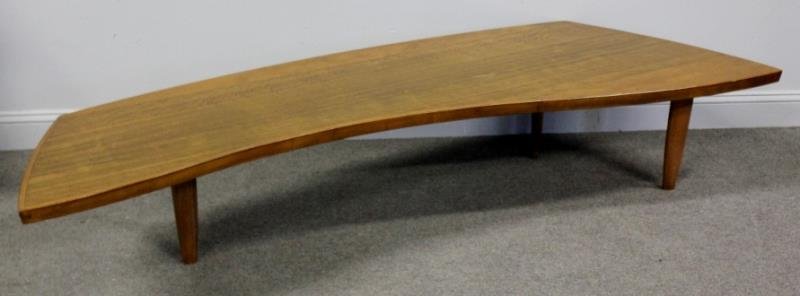 Midcentury Nakashima For Widdicomb Sundra Coffee: Table. Labeled Widdicomb, stamped "Sundra," stamped "Widdicomb," and stamped "George Nakashima." Three oval legs under inset wood organic top. From a White Plains, NY estate. Dimensions: 84" w x 30" d