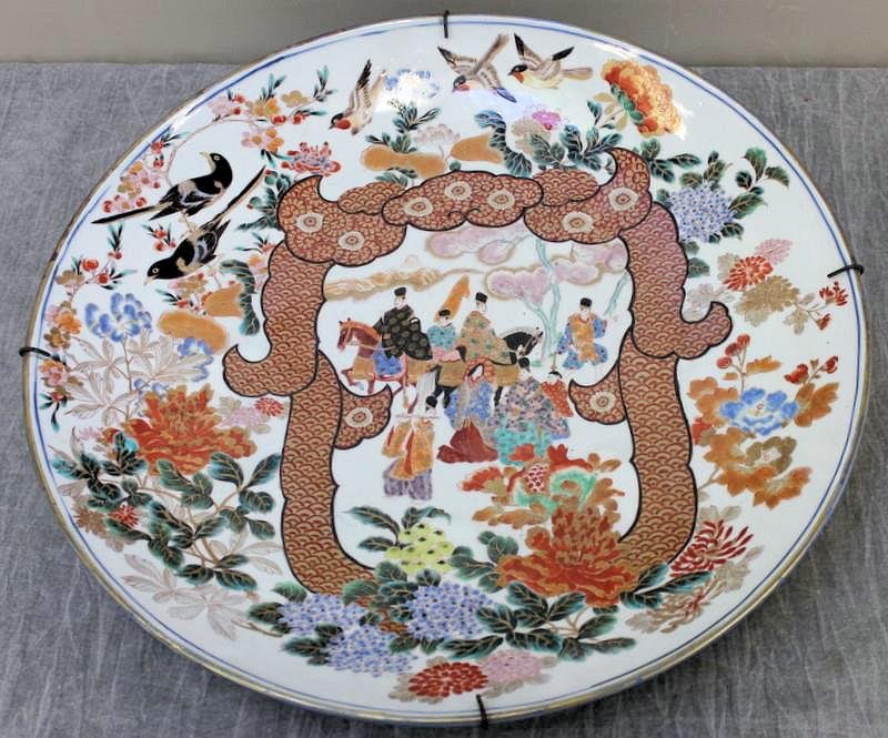 Large Signed Asian Charger.: With central figures on horseback. From a Connecticut estate. Dimensions: 25" diameter x 4" high. Condition: Good, with some gilt wear.