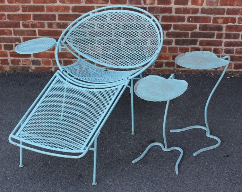 Midcentury Salterini Chaise Lounge.: With swing-out table. Together with two leaf form tables. From a New Rochelle, NY estate. Condition: Good outdoor vintage condition.