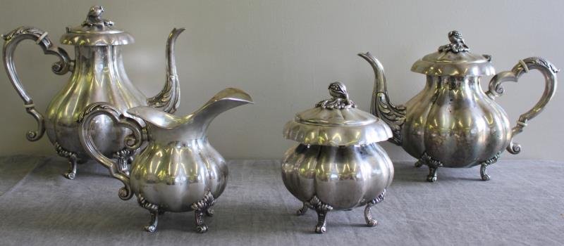SILVER. .800 Silver Italian 4 Piece Tea Set.: Marked .800, with a maker's mark lozenge containing the silversmith's number of 85, as well as FI? - possibly for Firenze/Florence, circa 1934-1944. All lids with beautiful pomegranate finials. Includ