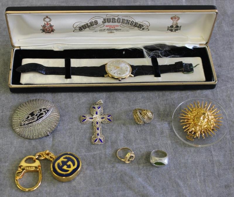 JEWELRY. Miscellaneous Gold and Sterling Grouping.: Includes an 18kt Jules Jurgensen man's wrist watch in original box; a large round Marcasite and sterling brooch; a Gucci keychain; a Chanel Lucite brooch; a sterling ring - size 6; a 14kt heart form r