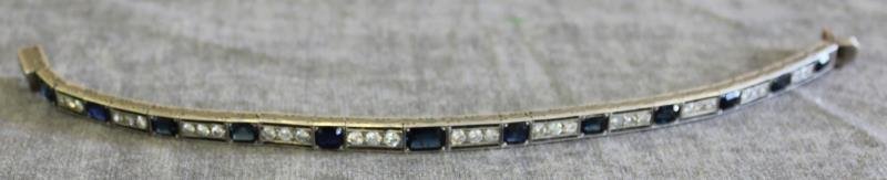 JEWELRY. Edwardian Sapphire and Diamond Bracelet.: Includes 12 sapphires with a larger center stone, and 36 diamonds of various sizes - between approx. 2 pts and 12 pts. Total approximate weight is 10.7 dwt. From a White Plains, NY estate. Dimensions: