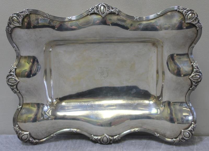 STERLING. Mauser Scalloped Edge Footed Tray.: Mauser Manufacturing Co, 1887-1903, New York. Total approximate weight is 35.38 troy oz. From a Guilford, CT estate. Dimensions: 14.125" w x 10.875" d x 2.675" h. Condition: With central monogram, a d