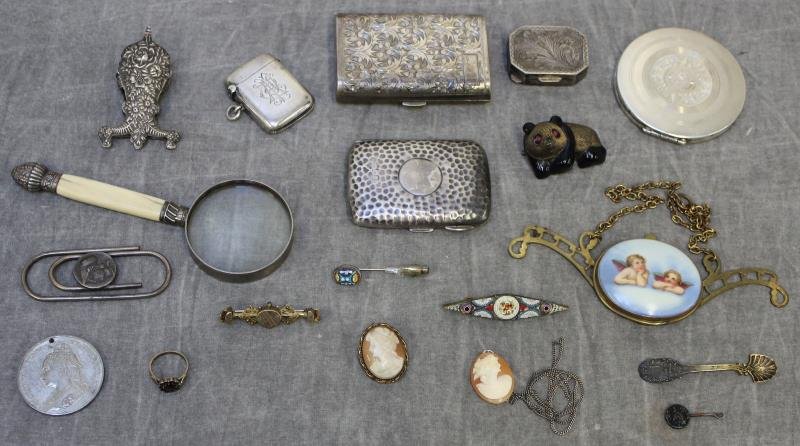 STERLING. Miscellaneous Silver and Objet d'arte: Grouping. Includes a silver and ivory hand mirror, 2 cameo pendants, a .900 silver gilded garnet ring, a silver panda brooch, a Mexican sterling pendant, a Kirk repousse clip, a micro mosaic stick pin