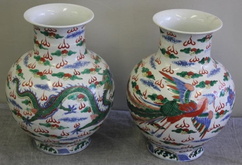 Pair of Signed Chinese Porcelain Balustrade Vases.: Wucai style from 20th century. From a 605 Park Ave, NYC estate. Dimensions: 9.5" w x 13" h each. Condition: Good.